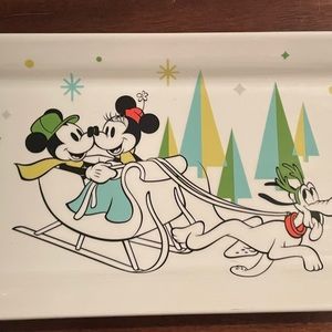 Holiday Mickey and Minnie being pulled by reindeer themed Pluto!